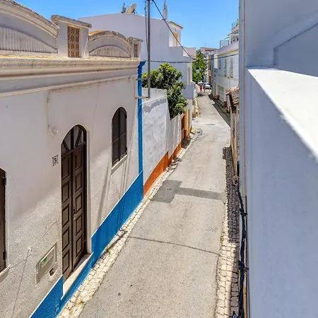 Little House In Centre Of *